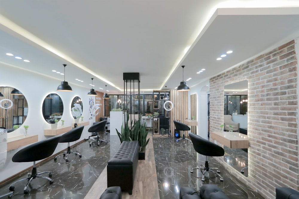 Bright, modern hair salon interior with styling chairs and large mirrors