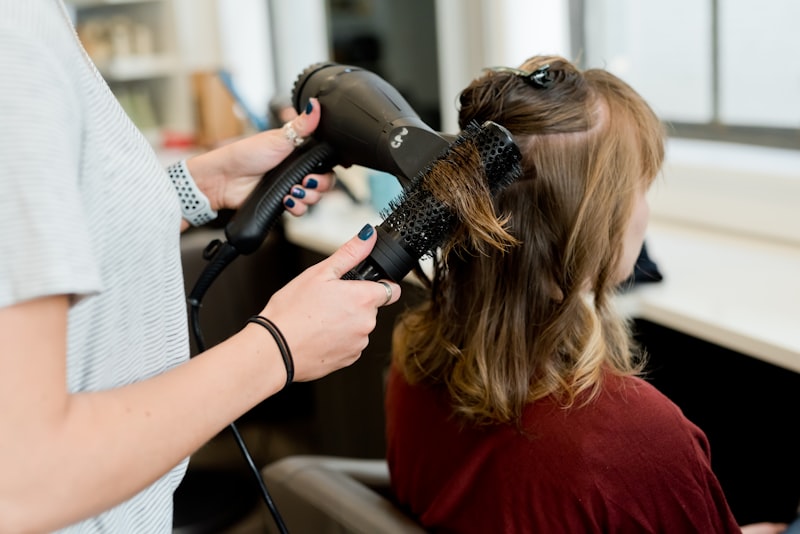 Close-up of a round-brush blow-dry adding shine and volume